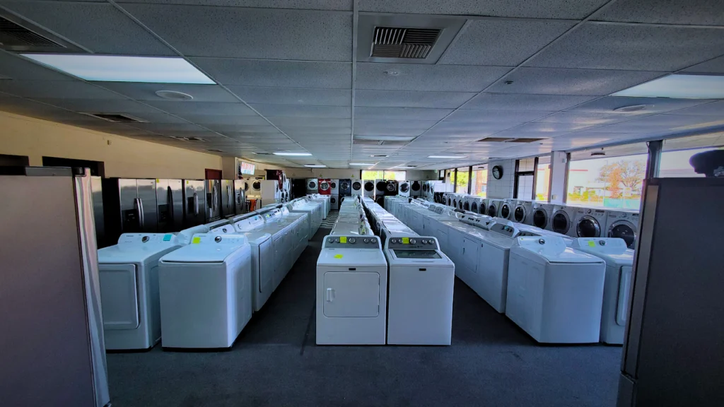 New and used washing machine are occupied at city appliances store in citrus heights