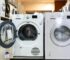 Open box electric dryer with open door next to a brand new boxed dryer at City Appliances